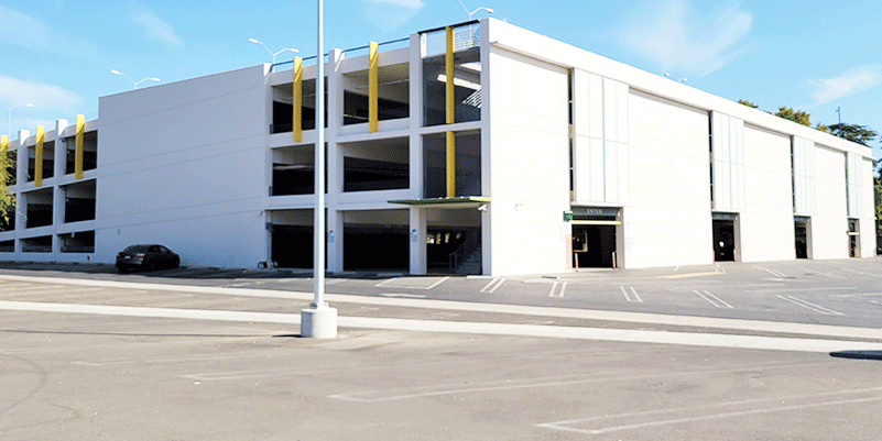 The open levels and white facade of Parking Structure B5.