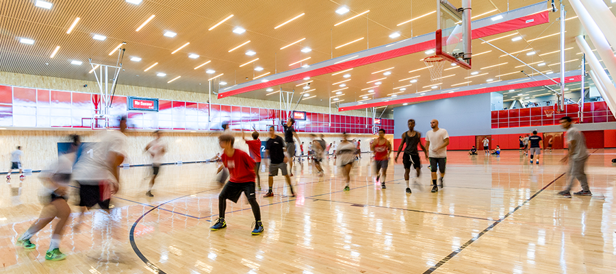 Students playing on the SRC Red Ring basketball courts.